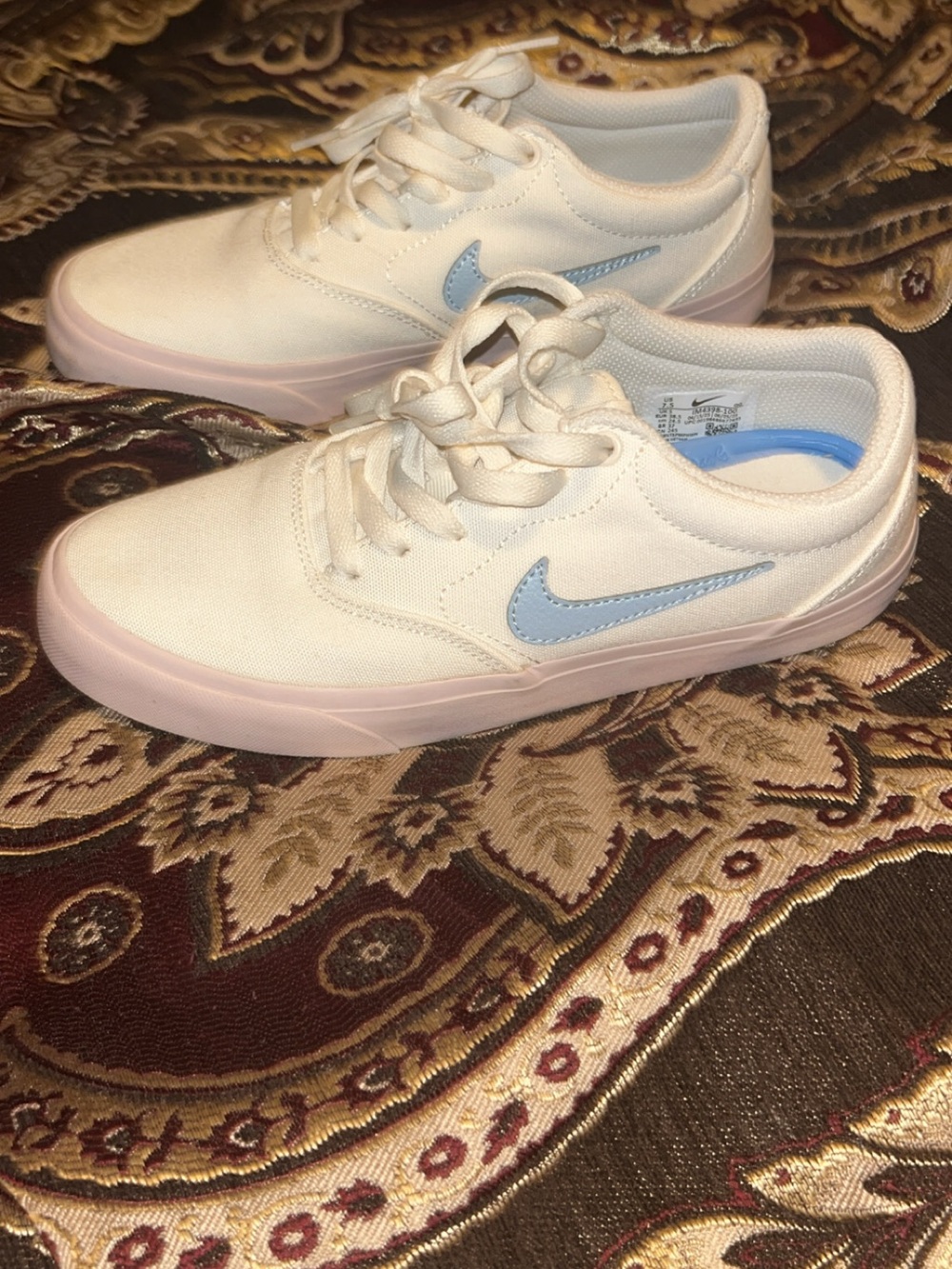 Nike Cream Canvas Sneakers with Light Blue Swoosh and Pink Trim